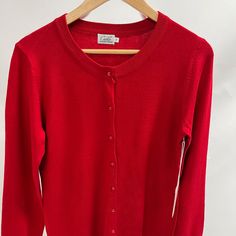 Regular Fit / Medium Weight, Stretchable And Soft Knit Fabric / Hits At Hip Ribbed Trim At Neck, Cuffs And Hem / Round Neck / Shank Button Closure Machine Wash Warm Red Crew Neck Cotton Cardigan, Fitted Red Sweater With Button Closure, Red Knit V-neck Cardigan, Cheap Red V-neck Cardigan, Red V-neck Sweater With Button Closure, Button Sweater, Shank Button, Red Sweaters, Soft Knits