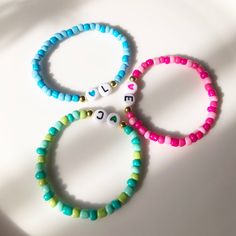 Discover the joy of Trio Friendship Bracelets for kids! These colorful, adjustable bracelets are perfect for celebrating the special bond between friends. Made from durable, skin-friendly materials, they are safe and comfortable for everyday wear. Each set includes three matching bracelets, making them ideal for sharing with best friends. Perfect for birthday gifts, party favors. Trio Friendship Bracelets are a fun and meaningful way for kids to express their friendship. Shop now and let the adv Swear Word Bracelet, Trio Clay Bead Bracelets, Handmade Friendship Bracelets As Gift, Handmade Flexible Friendship Bracelets As Gift, Colorful Adjustable Playful Friendship Bracelets, Playful Adjustable Friendship Bracelets With Round Beads, Adjustable Playful Friendship Bracelets With Round Beads, Trendy Turquoise Friendship Bracelets With Letter Beads, Custom Name Green Bracelet For Friendship