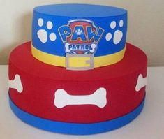 two cakes made to look like paw patrol hats