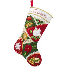 an embroidered christmas stocking hanging from a red ribbon with the word lauren written on it