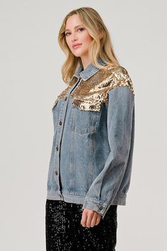 Gee Gee Washed look soft and comfy jean denim jacket with gold sequins accents on shoulders and pocket flaps. Extra Long sleeves, button up, collared, chest pockets. Southwest vibes. Casual and classy. It's a must have layer piece coat jacket. Color: Gold Combo Sizes: S-M-L J2-1/SJ1876 Embellished Denim Jacket For Fall, Denim Long Sleeve Jacket For Night Out, Spring Denim Jacket With Sequins, Sequin Denim Jacket For Spring, Embellished Gold Outerwear For Spring, Spring Embellished Gold Outerwear, Gold Embellished Outerwear For Spring, Embellished Medium Wash Denim Jacket For Fall, Trendy Denim Jacket With Sequins