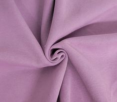 a close up view of a purple fabric