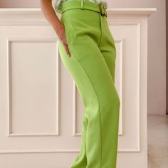 Brand: Folkah. From: Merida, Yucatan.

 Straight-cut pants with side slits at the ankle, side pockets, includes a belt with a tortoiseshell buckle. Slightly flexible fabric composition 97% polyester 3% elastane.

 SIZE GUIDE 














 S

 m

 L






 WAIST CONTOUR

 70

 75

 80






 HIP CONTOUR

 90

 95

 100






 THIGH CONTOUR

 54

 56

 58






 LONG

 105

 105

 105










 -Measurements shown in cm.

 -Measurements of the model (wears size S): bust 80, waist 67, hip 89, h Spring Trousers With Belt Detail, Spring Straight Pants With Belt Detail, Straight Leg Pants With Belt Detail For Spring, Elegant Green Wide Leg Pants With Pockets, Green Straight Pants For Work, Green High Waist Dress Pants With Pockets, High Waist Green Dress Pants With Pockets, Chic Green Pants With Pockets, Elegant Green Bottoms With Belt Loops