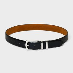 This Double Keeper Belt from A New Day™ in a solid black faux-leather finish gives any outfit an instant upgrade. It sports a lustrous silver-tone metal buckle with double keeper detail for a stylish look. The adjustable strap with multiple holes give a secure fit to all your outfits, and you can pair it with both casual or dressier ensembles for versatile styling. A New Day™: Style that goes wherever you do. Modern Black Belt For Business, Classic Black Belt For Workwear, Classic Black Belt For Work, Sleek Black Belts For Work, Classic Silver Belt For Business, Modern Black Business Belt, Black Leather Belt For Business Casual, Classic Black Belt For Business Casual, Sleek Black Belt For Workwear