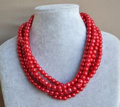 I make the necklace to use 8mm red glass pearl , red glass pearls.The necklace lengh is 18 inches .IT has a 2 inch long adjustable chain. I can make different type necklace to your requirements,Please feel free to contact me if you have any question. Thank you so much. . Red Round Beads Pearl Necklace For Wedding, Red Pearl Necklace With Round Beads For Wedding, Red Pearl Necklace For Wedding, Red Pearl Necklaces For Party, Party Red Pearl Necklaces, Elegant Red Round Pearl Necklace, Red Pearl Necklace, Bride Pearl Necklace, Fake Pearl Necklace