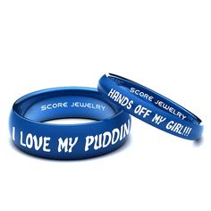 two blue bracelets that say i love my puddingin and the words score jewelry on them