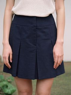 This is kuho plus’s mini skirt features a lively length and an attractive A-line silhouette. The pleat details on the front and back add a casual yet feminine touch. Made from a high-quality poly-linen blend with a refreshing feel, it is lightweight and comfortable to wear, with minimal wrinkles for easy care. Pair it with a jacket of the same material for a sophisticated set-up look.- A perfect item for daily wear- Can be matched with various styles of tops to create diverse looks- Versatile enough to be styled with any outfit for a clean  look Dark Academia Skirt, Inverted Pleat Skirt, Knee Length Skirts, Clueless Outfits, Catholic School, Church Decor, Clothes Ideas, Set Up, Pleated Mini Skirt