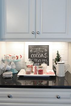 the kitchen counter is clean and ready to be used for christmas dinner or desserts