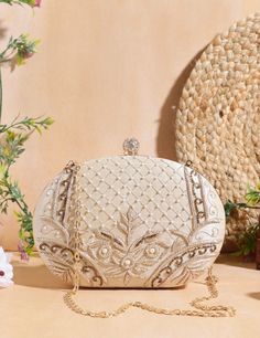 Introducing the Luxury Embroidered Oval Clutch, a stunning accessory designed to add a touch of elegance to any outfit. Perfect for brides, weddings, and special occasions, this designer clutch features intricate embroidery, a chic round shape, and an ethnic shoulder strap. It makes a thoughtful and luxurious gift for her. Description: Luxury Embroidered Oval Clutch | Bride Gift | Wedding Gift | Purses For Her | Ethnic Shoulder Strap Bag | Designer Clutch | Fashion Bags Material: Crafted from hi Period Wedding, Luxury Clutch, Oversized Clutch, Gold Clutch, Sequin Embroidery, Designer Clutch, Shoulder Strap Bag, Strap Bag, Wedding Bag