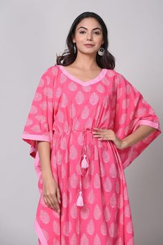 Pink Floral Kaftan, Hand Block Print Kaftan, Women's Kaftan, Beach Cover Ups, Women's Night Wear, Cotton House Kaftan, Floral Pink Cover Up Product Details - Pattern - Decorative border short kaftan Colour -White Floral print with Light Pink background Sleeves - loose 3/4th sleeves Neck design - Scoop- neck Bottom - Palazzo Wash - Hand Washable Kaftan length - 28 inch Fabric - 100% Cotton Size: Free Size (Fits Most) Occasion: Beachwear, Nightwear, Loungewear Package Includes: 1 Pink Floral Hand Block Print Kaftan Specialty - White Floral print with Pink background Whether it's a coffee date with your best friends or dinner date with your partner, looking like an absolute trendsetter is an unsaid rule. Set aside all your worries to find the perfect outfit because this aesthetic White Floral Festive Pink Kaftan For Beach, Summer Vacation Tunic Sets, Bohemian Tunic Beach Set, Bohemian Beach Tunic Set, Festive Beach Pink Kaftan, Festive Pink Beach Kaftan, Summer Beach Pink Kurta, Pink Summer Beach Kurta, Pink Floral Print Kaftan For Festival