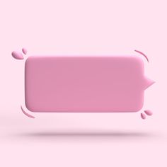 a pink rectangular object floating in the air with its shadow on it's side