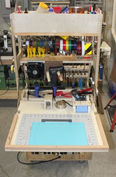 a workbench with many tools on it