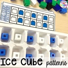 an ice cube pattern is shown with blue and green blocks next to it on a table