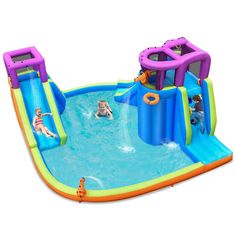 an inflatable water slide with two kids playing on it and another child swimming