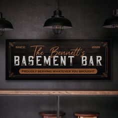 a bar with stools and a sign that says the benefits basement bar proudly serving whatever you brought