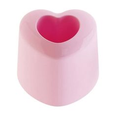 a pink heart shaped container on a white background