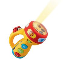 a yellow and red toy is flying through the air with its light on it's side