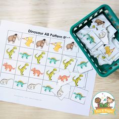 the dinosaur abc pattern match is next to a green tray filled with dinosaurs and letters