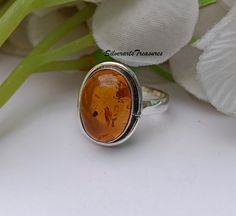 Natural Amber Ring, Amber Gemstone Ring, Beautiful Amber Ring, Amber Stone Jewelry, November Birthstone Ring, 925 Silver Ring, Stylish Ring Amber Stone Benefits Amber helps to balance the emotions, clear the mind and release negative energy. It aids manifestation, eases stress by clearing phobias and fears, and it's a lovely warm stone to wear Yellow amber has been used traditionally by natural healers to improve memory, increase mental flexibility and create balanced decision-making. Amber has Amber Sterling Silver Jewelry For Anniversary, Sterling Silver Cabochon Wedding Rings, Sterling Silver Amber Birthstone Rings, Amber Birthstone Rings For Anniversary, Classic Amber Jewelry For Wedding, Amber Cabochon Ring For Anniversary, Amber Sterling Silver Rings For Anniversary, Amber Jewelry With Polished Finish For Anniversary, Amber Sterling Silver Jewelry For Promise Ring