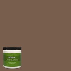 a can of marquee paint on a dark brown background with the words marquee