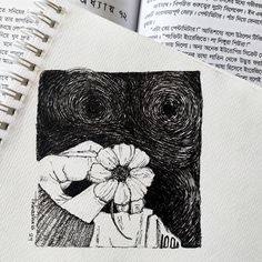 a drawing of a hand holding a flower