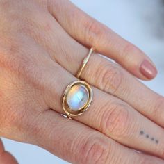 Moonstone cabochon 14k yellow gold 1.3mm band thickness Handmade by Halcyon Jewelry in Maine Timeless jewelry made by hand. Inspired by the ancients, imbued with magic, and made with love & sustainability in mind. Made with recycled metals and responsibly sourced stones. Timeless Jewelry, Recycled Metal, Moonstone Ring, Made With Love, Handmade Ring, Moonstone, Diy Jewelry, With Love, Sustainability