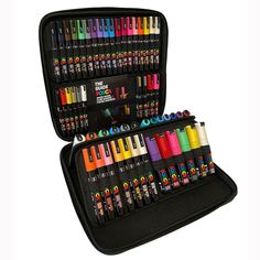 an open case filled with lots of different colored crayons