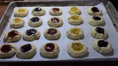 there are many cookies with jams on them