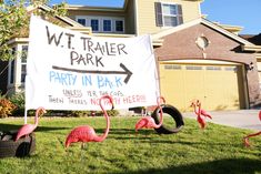 pink flamingos stand in front of a sign that reads w t trainer park party in back