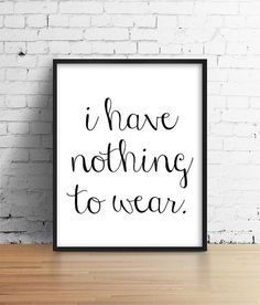 a black and white poster with the words i have nothing to wear in cursive writing