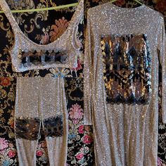 This Is Gorgeous! It’s Ideal For Tiny Busted Ladies Xs-Medium With Stretchy Sequin Fabric With A Bit Of Stretch But Best For Busts 34 And Under. There Is A Matching Sequin Lightweight Cardigan And All 3 Pieces I Customed To Match With Vintage Fabrics. It’s Truly Beautiful And Like All Of My Designs, A One Of A Kind Creation Using What We Already Have On This Planet Rather Than Contribute To Global Warming For Our Designer Fix. Free Gifts With Purchase And Discounts On Bundles! Follow My Designs, Sales And Shows On Ig: Farrahnaykaashline. Glamorous Silver Sets For Festive Season, Glamorous Silver Festive Sets, Glamorous Festive Silver Set, Glamorous Embellished Silver Set, Embellished Silver Party Sets, Silver Elegant Party Sets, Elegant Silver Party Sets, Stretch Sequin Party Sets, Elegant Silver Sequined Sets