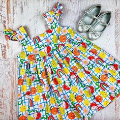 "Visit https://www.etsy.com/shop/ateliergaiana/?section_id=38140727 to check out other back to school dresses from AtelierGaiana! Your search for that unique and chic girls summer dress, apple dress, pear dress, caterpillar dress, rainbow dress for your mini fashionista or a perfect fruit baby shower gift is over! Say hello to the Fruit Cuties \"Henrietta\" dress by AtelierGaiana! This dress has a babydoll style bodice, a square neckline, gathered flutter sleeves, and a gathered skirt with an em Fun Spring Sundress For Playtime, Spring Sundress For Playtime, Whimsical Summer Dresses For Playdate, Playful Multicolor Dress For Picnic, Fun Summer Dress For Picnic, Cute Orange Cotton Sundress, Cute Sundress For Picnic, Orange Sleeveless Dress For Playtime, Whimsical Summer Playtime Dress