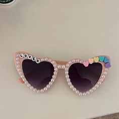 Taylor Swift X Stoney Clover Pop Up Heart Shaped Lover Sunglasses New And Never Used From The Scl Event In New York A Few Weeks Ago! Never Worn! Would Be Perfect For The Concert! Taylor Swift Lover Sunglasses, Lover Sunglasses Taylor Swift, Cute Sunglasses With Beads, Lover Outfit Taylor Swift, Taylor Swift Sunglasses, Lover Sunglasses, Preppy Nails, Diy Sunglasses