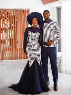 a man and woman standing next to each other