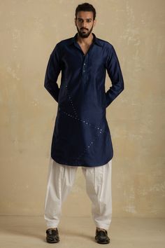 Featuring an ink blue pathani kurta in chanderi base with mirror embroidery. It is paired with contrasting cotton salwar pants.  FIT: True to size. COMPOSITION: Chanderi, Cotton. CARE: Dry clean only. Kurta Designs Men's, Pathani For Men, Drop Fade Haircut, Salwar Pants, Mirror Embroidery, Kurta Men, Mens Kurta Designs, Salwar Designs, Pants Fit