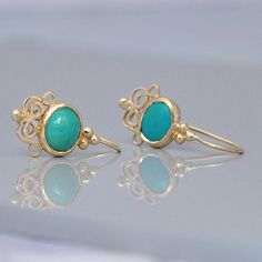 "These gold and Turquoise earrings are oriental style earrings they are a perfect Christmas jewelry gift. The earrings are 14k gold. You will love the Turquoise color combination of the stone with the yellow gold. These earrings are in a perfect measurements - not too small and not too big and are easy to distinguish with a long hair or a short hair. The earrings can be made with other type of stones and every new combination is a surprise for me.If you would like to have another type of stone o Turquoise Earrings With Lever Back Ear Wires As Gift, Turquoise Earrings With Lever Back Ear Wires For Gifts, Fine Jewelry Turquoise Earrings For Gift, Elegant Turquoise Earrings With Lever Back, Turquoise 14k Gold Earrings As Gift, Turquoise 14k Gold Earrings For Gifts, Turquoise Filigree Earrings As Gift, Turquoise Filigree Earrings For Gift, Vintage Style Wedding Rings