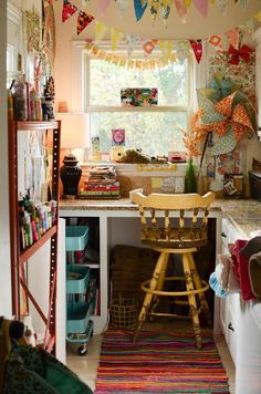 the kitchen is decorated with bunting flags and decorations