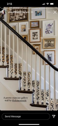 a staircase with pictures on the wall and framed photos on the wall above it, along with a black banister