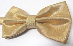 Mens Bowties. Lamé Gold Metallic Bowtie With Matching Pocket Square Option Adjustable Bow Tie For Party, Gold Adjustable Suit And Tie Accessories For Party, Adjustable Gold Bow Tie For Black Tie Events, Gold Bow Tie With Detachable Bow For Formal Events, Classic Gold Bow For Black Tie Events, Gold Dapper Bow Tie For Formal Occasions, Adjustable Gold Bow For Black Tie Event, Gift Gold Bow Tie, Formal Gold Bow Tie With Detachable Bow