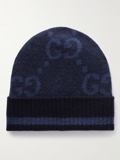 There's no mistaking this beanie for anything but a Gucci design. It's been jacquard-knitted in Italy from super-soft cashmere and patterned with the house's unmistakable monogram. We're stocking the matching gloves, too. Designer Beanie For Winter, Mens Dress Attire, Gucci Beanie, Shop Gucci, Gucci Collection, Apparel Design Inspiration, Beanie For Men, Business Basics, Future Wardrobe