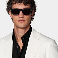 Cut to a tailored fit with a natural unpadded shoulder, this off-white blazer features jetted pockets and a widened notch lapel. Timeless White Outerwear With Concealed Placket, Timeless White Outerwear With Lapel Collar, White Timeless Outerwear With Lapel Collar, Luxury White Outerwear With Concealed Placket, White Notch Lapel Blazer With Concealed Placket, White Classic Blazer With Concealed Placket, Classic White Outerwear With Concealed Placket, White Business Blazer With Concealed Placket, White Blazer With Concealed Placket