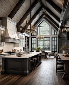 a large kitchen with wooden floors and vaulted ceiling