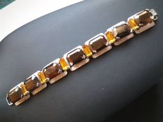 ON SALE High-end rhinestone bracelet, collectible costume jewelry 1950s 1960s and very good vintage condition. Measure is just over 7 and 3/4 inches long by 3/4 inches wide by 1/4 inch tall. A very striking collectible piece. 1950s Bracelet, Desert Hot Springs, Vintage Designer Jewelry, Turquoise Bracelet Cuff, Turquoise Cuff, Rhinestone Bracelet, Stone Bracelet, Chain Link Bracelet, Photo Jewelry