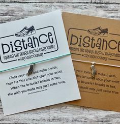 two bracelets with words on them sitting next to each other, one saying distance and the other saying distance