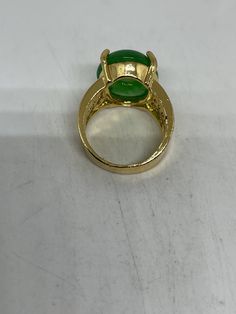 Vintage Lucky Green Nephrite Jade ring Large green nephrite jade Ornate gold finished White bronze Vintage ring, does not tarnish, NOT sterling Size 6.5, 7, 7.5, or 8 ONLY My jeweler can custom re size for a $10-$20 fee All rings are shipped free in the US in a nice gift box. Check out our over a THOUSAND great reviews Engraving is $4 per letter and is not always perfect depending on the piece. It can take a few days if the jeweler is busy. This is payable to Paypal Judithsltd@gmail.com Formal Green Cabochon Rings, Gold Jade Emerald Ring, Green Cabochon Dome Ring For Formal Occasions, Green Oval Enamel Ring For Formal Occasions, Formal Green Enamel Ring With Polished Finish, Formal Green Oval Enamel Ring, Formal Oval Green Enamel Ring, Green Dome Ring For Formal Occasions, Green Oval Enamel Ring For Anniversary