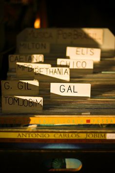 many books are stacked on top of each other