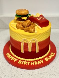 McDonalds cake Mcdonalds Cake Ideas, Mc Donald Cake, Mcdonalds Cake, Yellow Frosting, Mcdonalds Birthday Party, Burger Cake, Mcdonalds Fries, Burgers And Fries, Mc Donald's