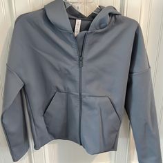 Zip Up Slate Blue Soft Jacket. 2 Front Pockets 56% Nylon, 44% Elastane. Excellent Condition. Loose Fit. No Stains. Never Worn Blue Moisture-wicking Outerwear For Workout, Moisture-wicking Blue Outerwear For Workout, Functional Blue Outerwear For Workout, Blue Sportswear Outerwear For Workout, Blue Hooded Outerwear For Workout, Gray Hooded Outerwear For Workout, Soft Jacket, Blue Soft, Slate Blue