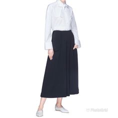 The Row Venna Pant, Cropped With High Rise And Split Pockets. Side Zip Closure With Tie Back. Last Three Pics For Reference. Color Is Black. Chic Black Wide Leg Pants For Daywear, Elegant Black Daywear Bottoms, Elegant Black Bottoms For Daywear, Elegant Formal Culottes With Pockets, Elegant Culottes With Pockets, Brown Leather Pants, Black Ankle Pants, Cropped Chinos, Cuffed Pants