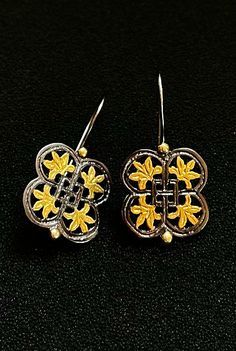 These Vintage Engraved Flower Earrings are made completely out of Silver 925 (aka Sterling Silver, each piece is stamped). A pair of Byzantine Earrings that will make your outfit magnificent. Those Ancient Greek Style Earrings are also Gold Plated so that they contrast on the oxidized parts. These Dainty Silver 925 Drop Earrings can be the perfect graduation gift. Vintage and Geometric as they are those beautifully handmade Earrings can make their Statement. Those Unique and Antique Style Earrin Intricate Flower-shaped Earrings For Gift, Traditional Pierced Flower Shaped Earrings, Yellow Earrings With Intricate Design For Gift, Silver Byzantine Pierced Earrings, Silver Round Byzantine Earrings, Traditional Sterling Silver Flower-shaped Earrings, Traditional Sterling Silver Flower Shaped Earrings, Traditional Sterling Silver Earrings In Flower Shape, Handmade Formal Drop Flower Earrings